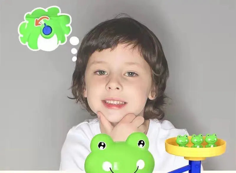 Child playing with frog balance addition game