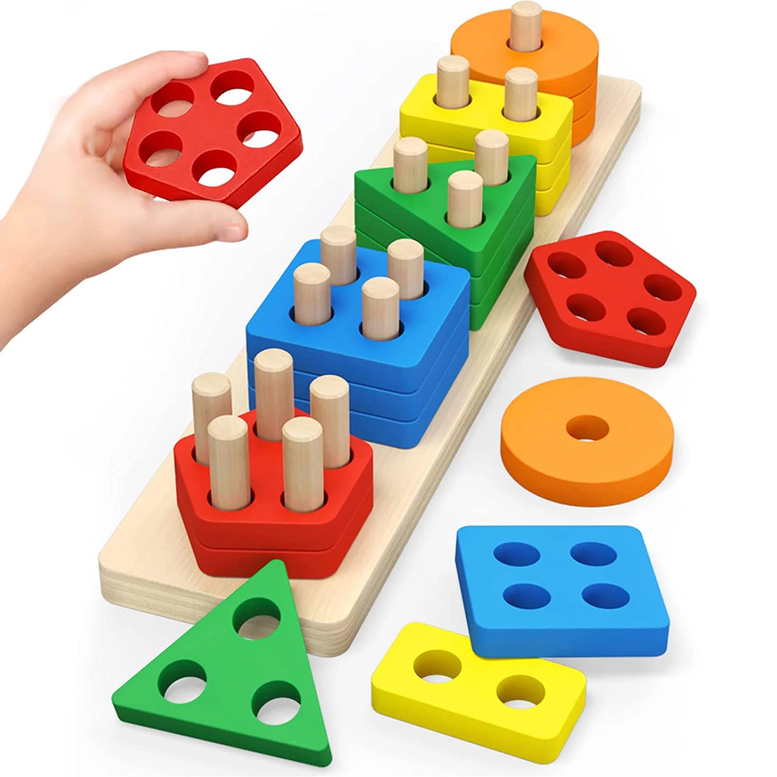 Toddler developing fine motor skills with stacking puzzle toy
