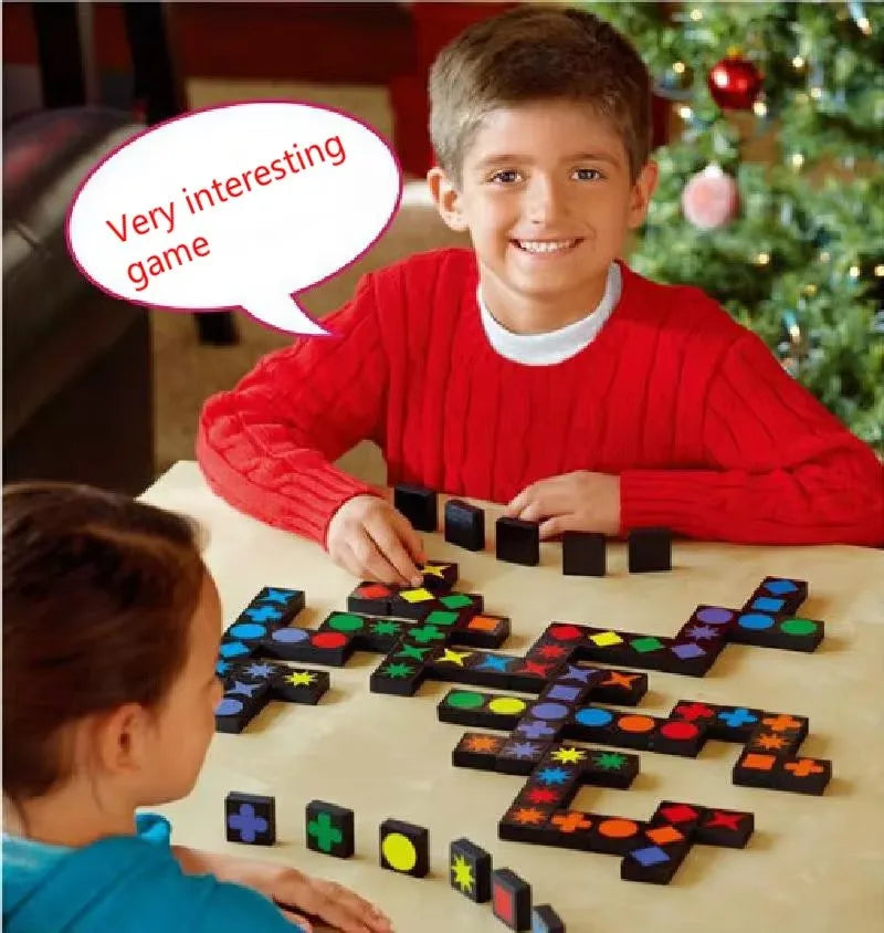 Child playing Qwirkle educational game developing reasoning skills.
