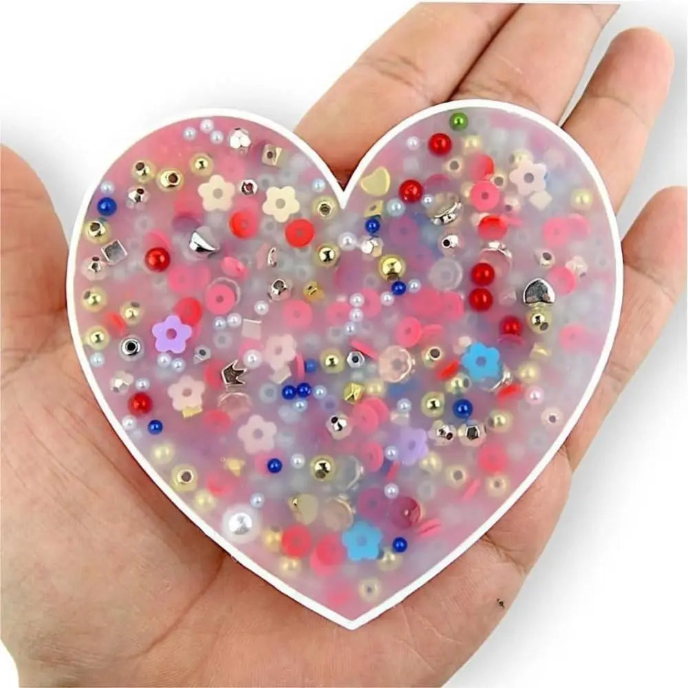 Hands holding a lightweight, durable silicone sensory toy for skin picking reduction.