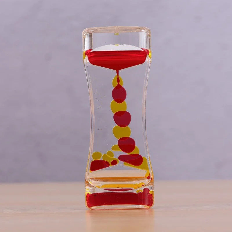 Close-up of vibrant hourglass bubbler used in mindfulness practice