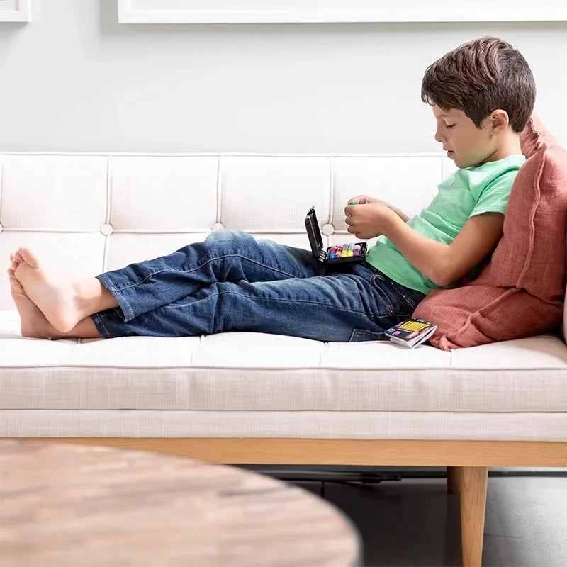 Child solving a 3D Kanoodle puzzle for brain training and STEM learning