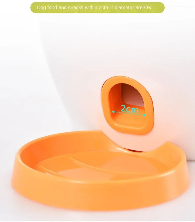 Orange pet food bowl with a small inset showing '2cm' on a white background.