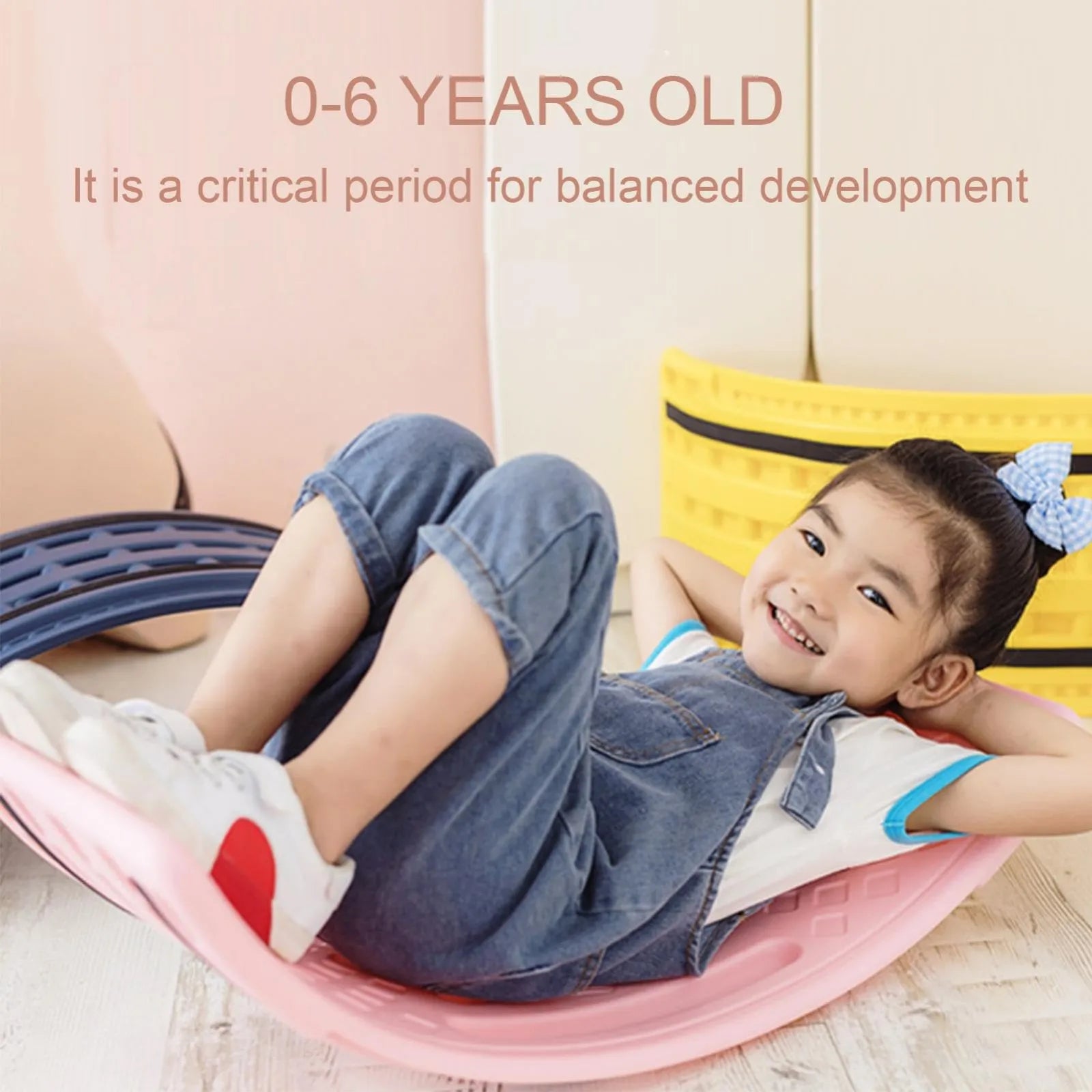 Child rocking on seesaw balance board improving core strength and coordination