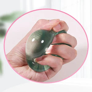 ChillCube™ fidget toy sitting on student’s desk beside school supplies