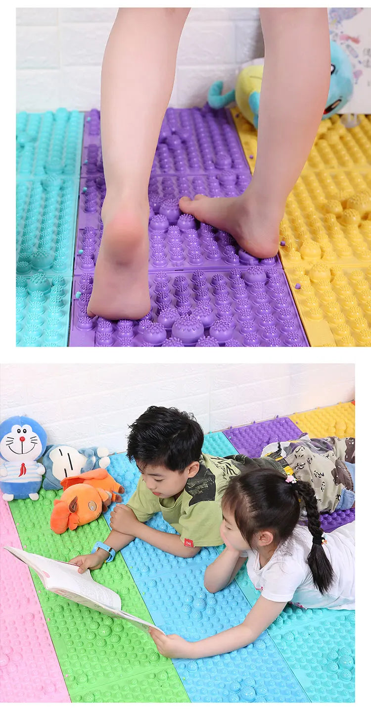 Child enjoying sensory play on massage pressure mat.