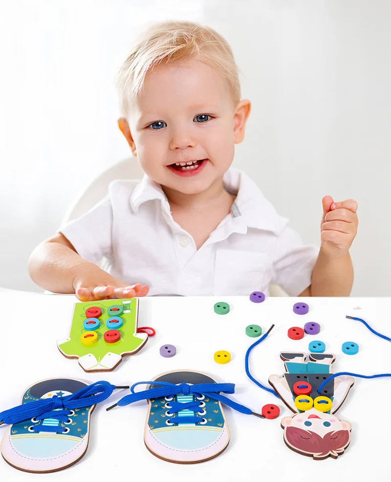 Toddler playing with Montessori life skills threading and button board