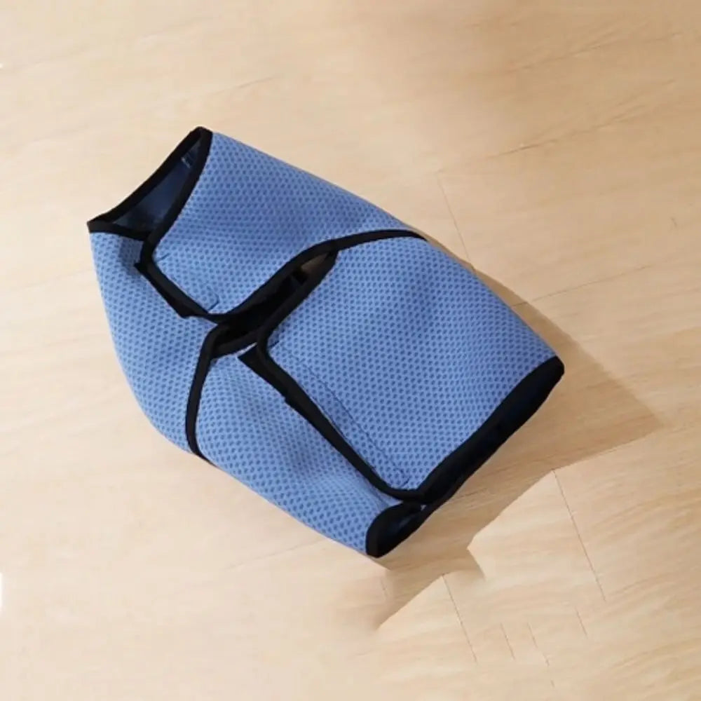 Close-up of adjustable strap on pet calming vest