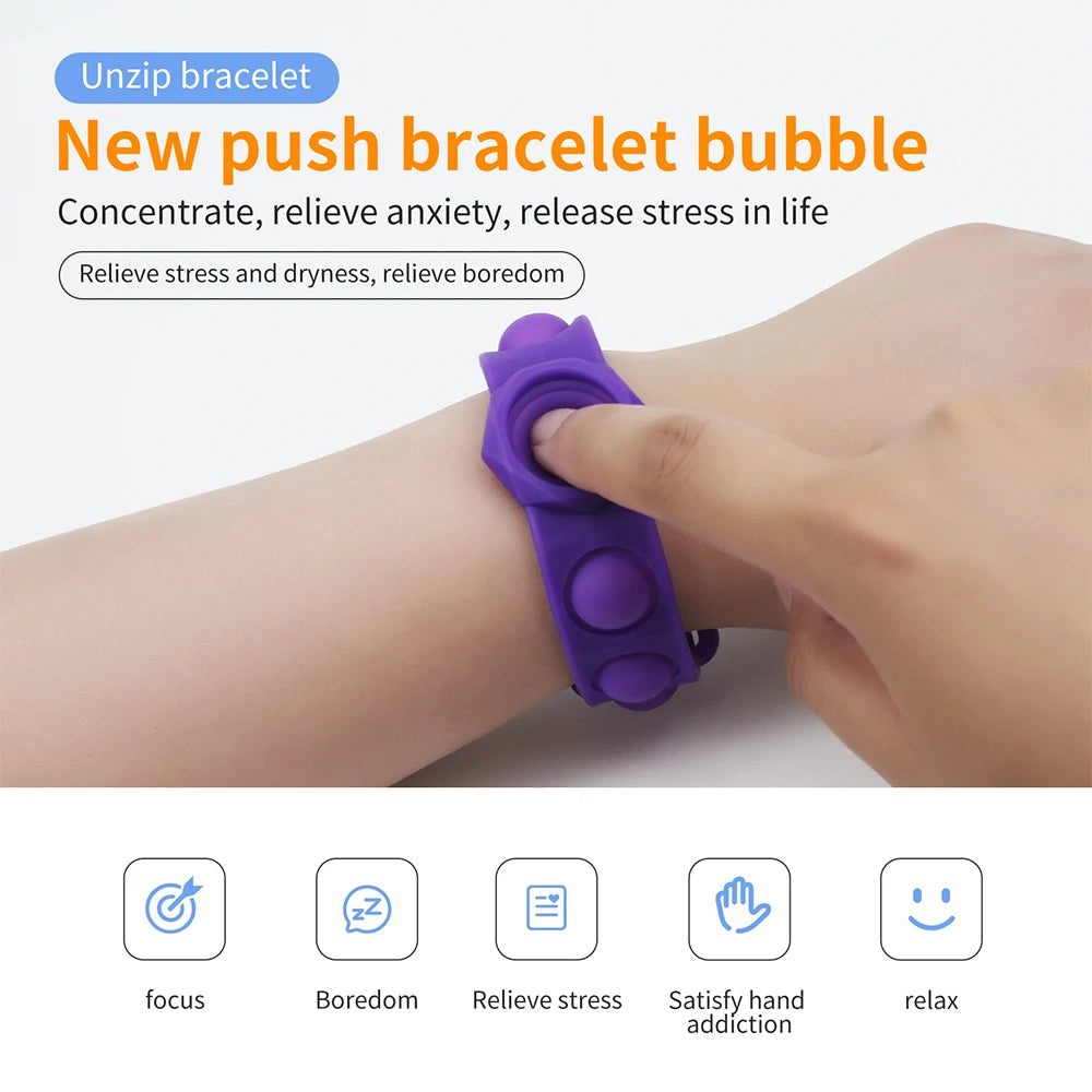 Adult fidgeting with stress relief sensory bracelet.
