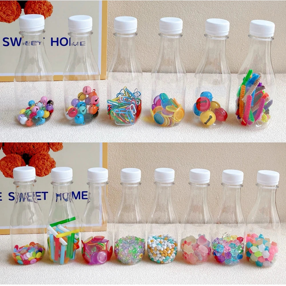 Sensory bottle toy promoting grasping and motor development.