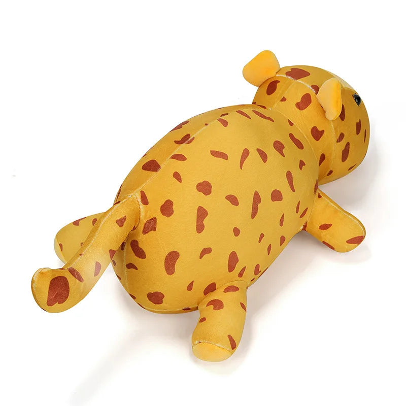 Yellow plush toy with brown spots on a white background