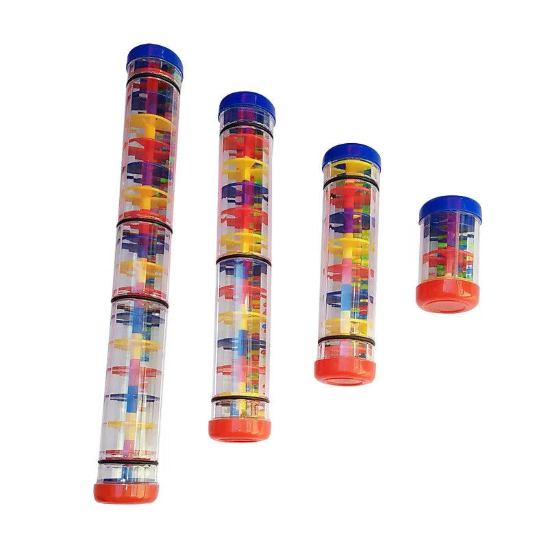 Set of colourful sensory rain sticks with transparent ends on a white background