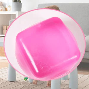 Assorted sensory toys including ChillCube™ used in autism support therapy session