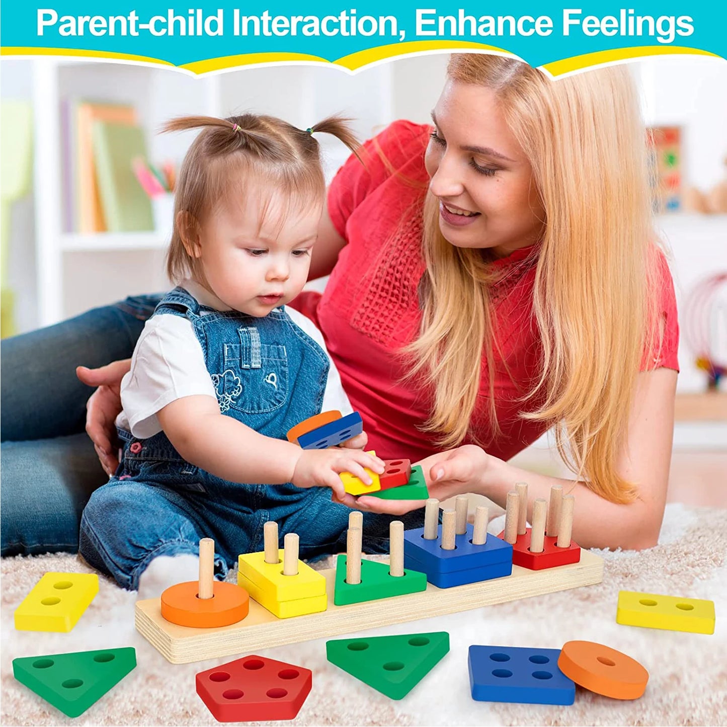 Baby learning to stack rainbow wooden rings by size and shape