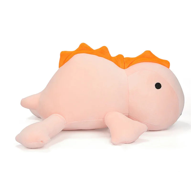 Plush toy resembling a baby dinosaur with an orange tuft on a white background