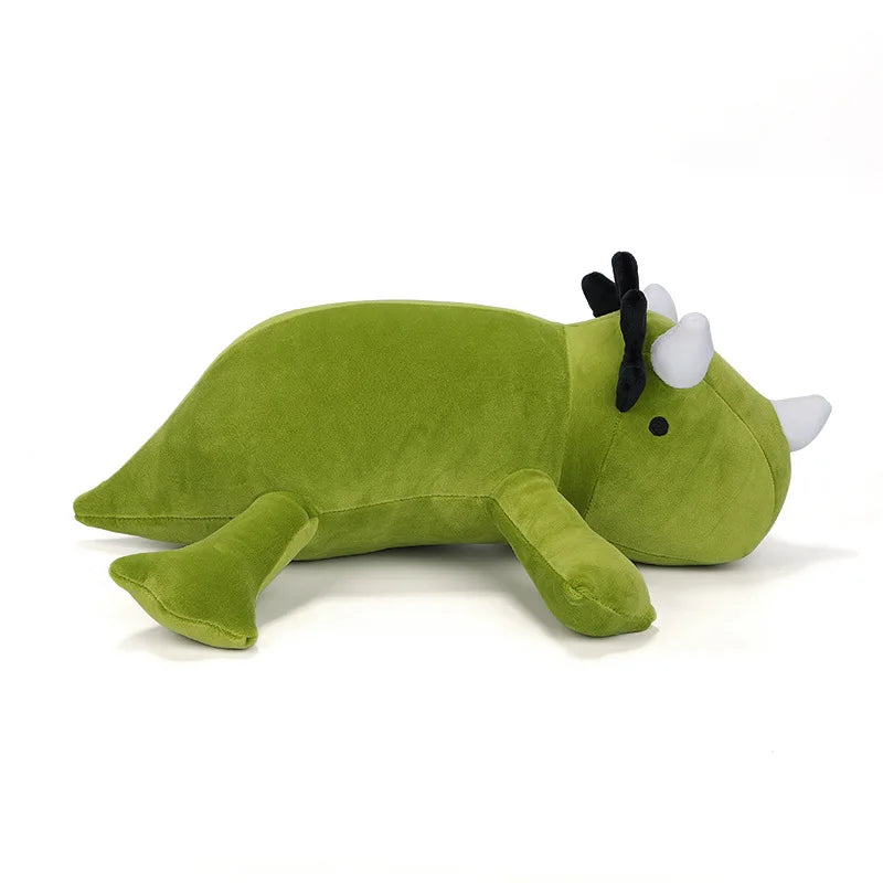 Green plush toy dinosaur on a white background