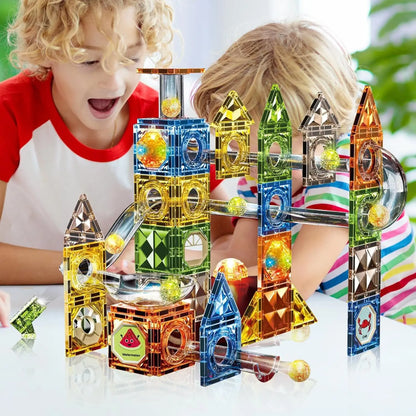 Interactive magnetic building set with rolling marbles