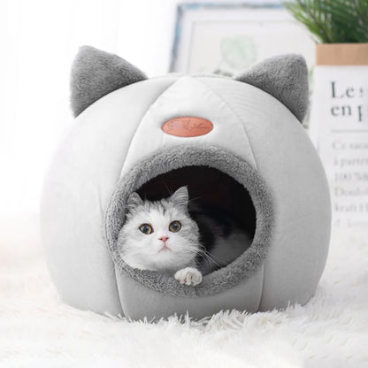 Winter cat cave bed with soft plush interior for deep sleep and warmth
