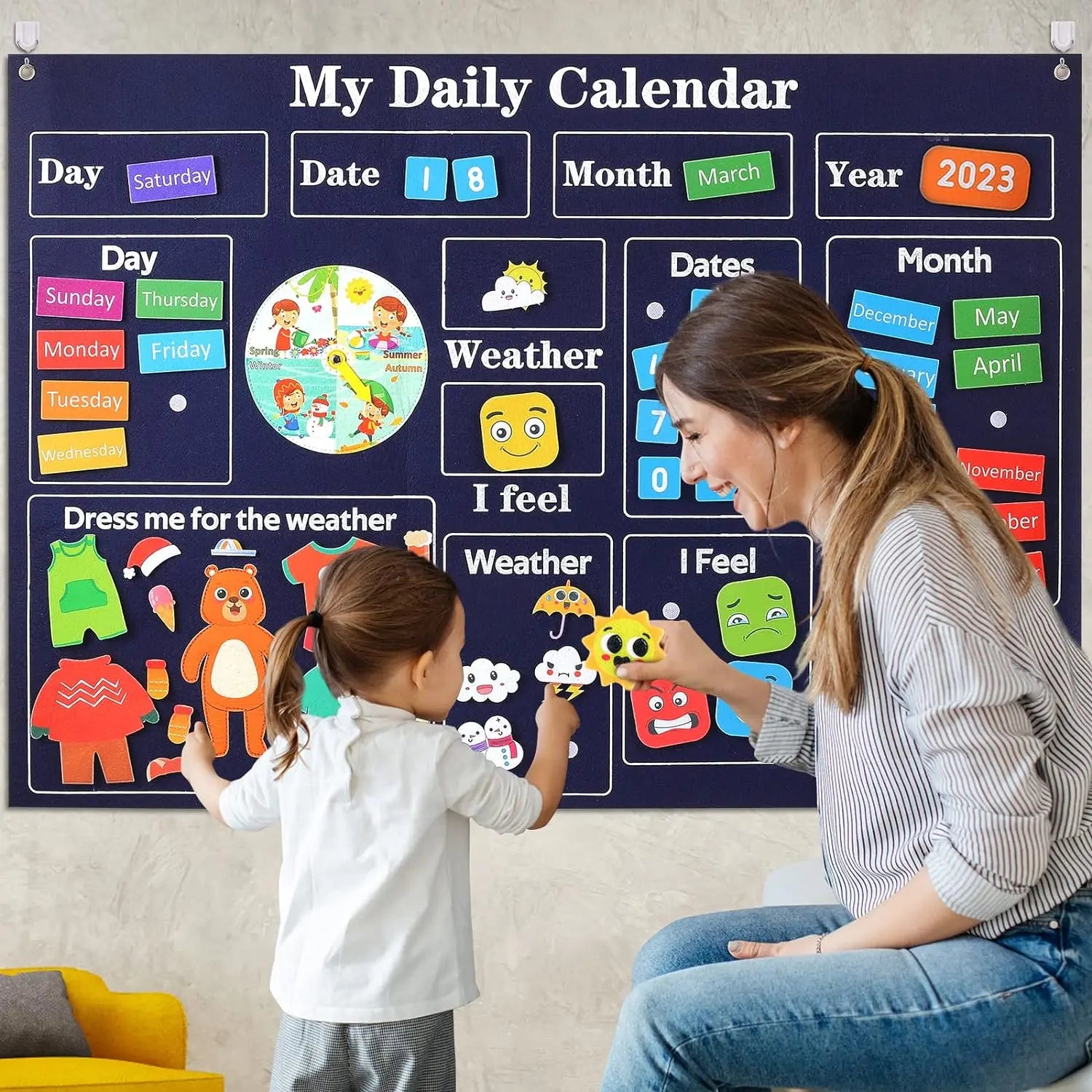 Felt calendar with movable date, weather, and emotion tiles for independent learning

