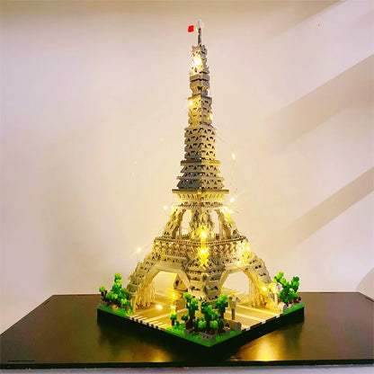 LED illuminated Eiffel Tower micro building blocks set assembled and glowing in the dark