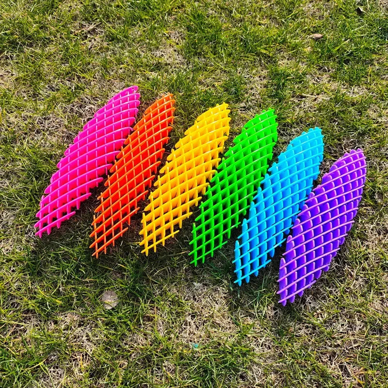 worm-shaped fidget toy with poppable and squishy surface